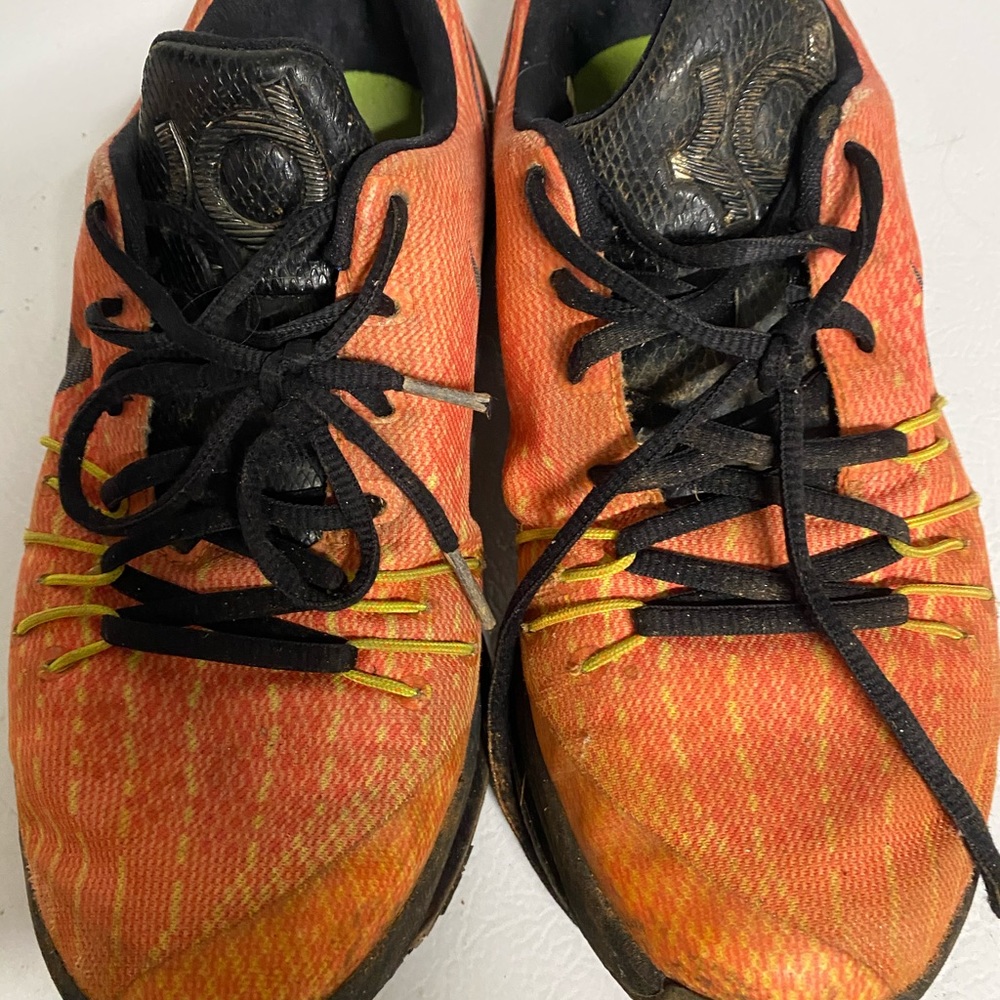 Orange Nike shoes